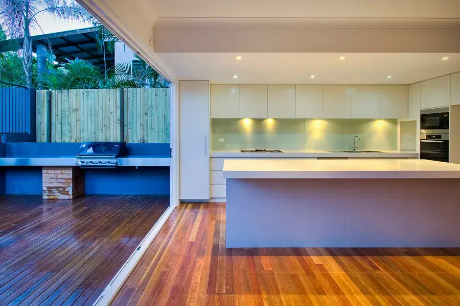 Deck and patio structural design for luxury outdoor kitchen in Kingsholme.