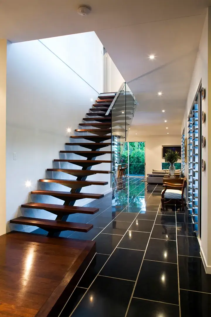 Timber structural design for custom internal stairs in a residential Brisbane home.